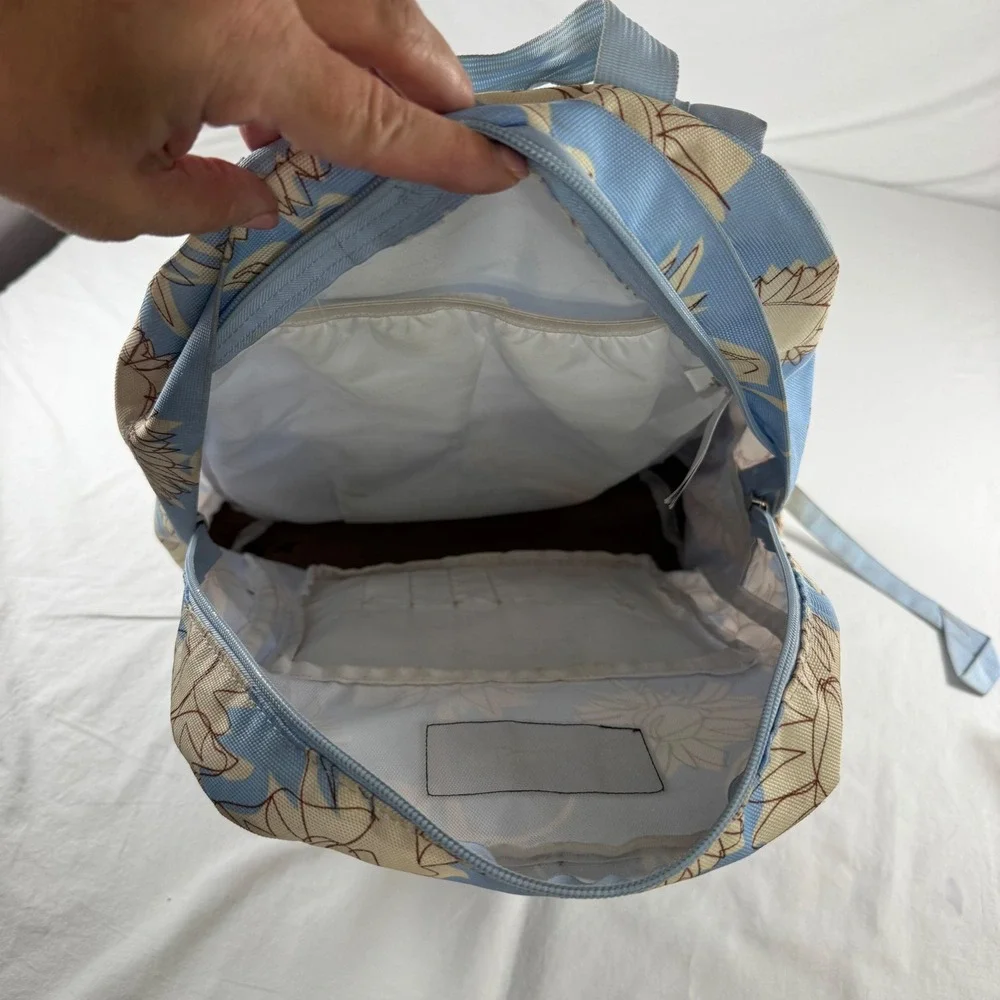 JanSport Blue Sunflower Floral Suede Bottom Right Pack Backpack